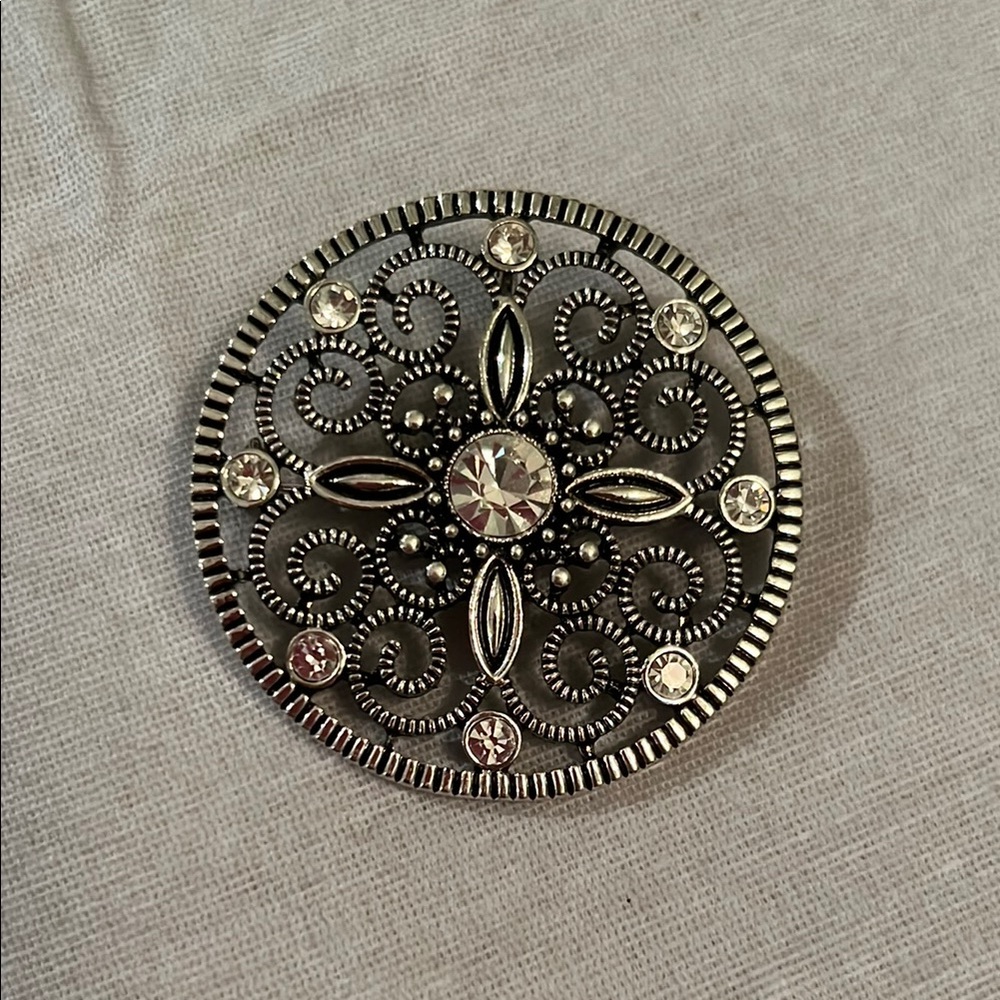 Silver and Black Floral Brooch with Vintage Design